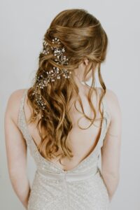 Long wavy hair with a braided accent, back view